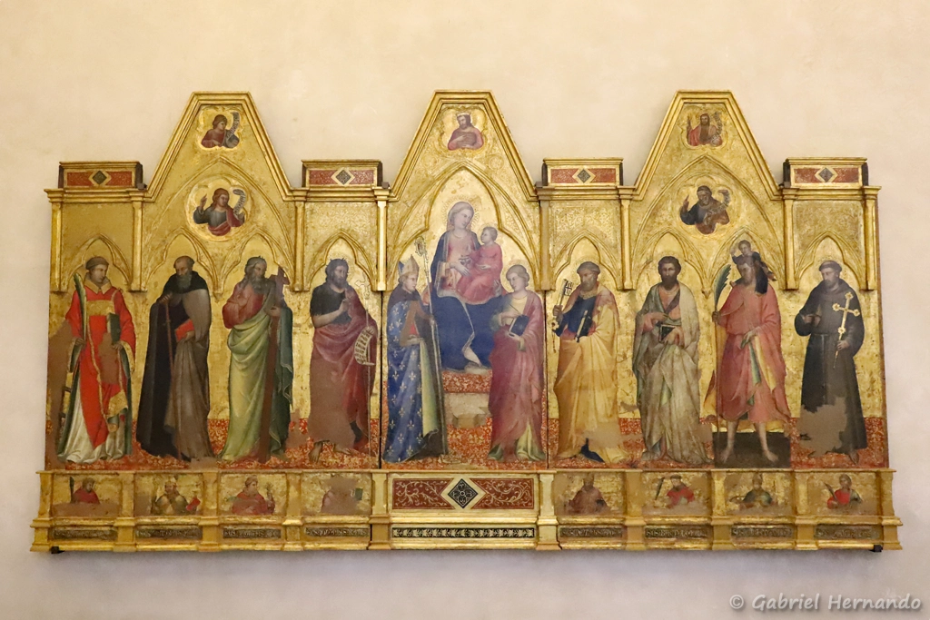 La Vierge à l'Enfant trônant entre les saints Louis de Toulouse et Jean l'Évangéliste, avec les saints Jean-Baptiste, André, Antoine l'Abbé et Laurent (à gauche), Pierre, Barthélemy, Christophe et François d'Assise (à droite), Oeuvre de Lorenzo di Niccolo, début du XVe siècle (Florence, Italie, octobre 2024)